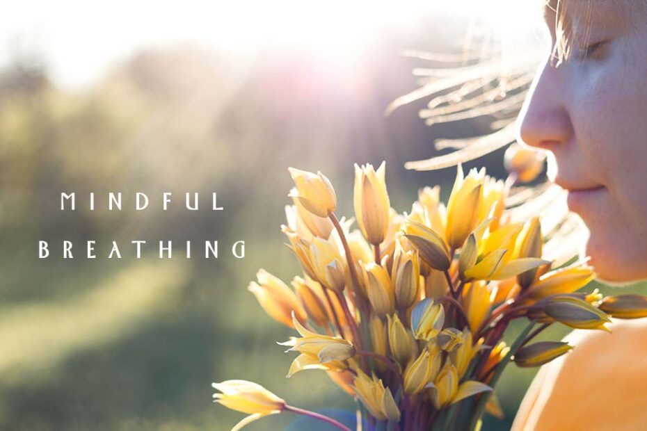 Benefits of Mindful Breathing for Stress Relief - A girl breathing and smelling the scent of fresh flowers in her hands with her eyes closed